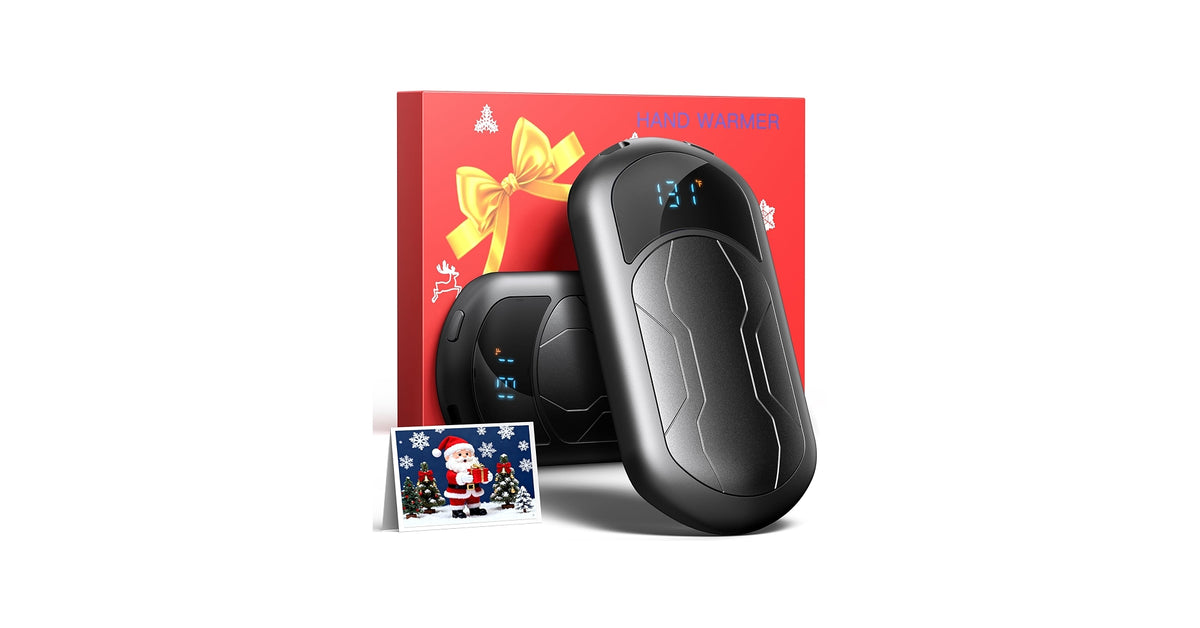 Mains réchauffées par un chauffe-mains rechargeable en hiver