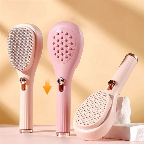 Brosse démêlante autonettoyante rose avec picots souples