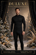 Homme portant l'ensemble thermique noir DULUXE, haut et pantalon doublés, couche de base chaude pour affronter le froid, ambiance hivernale premium noir et doré