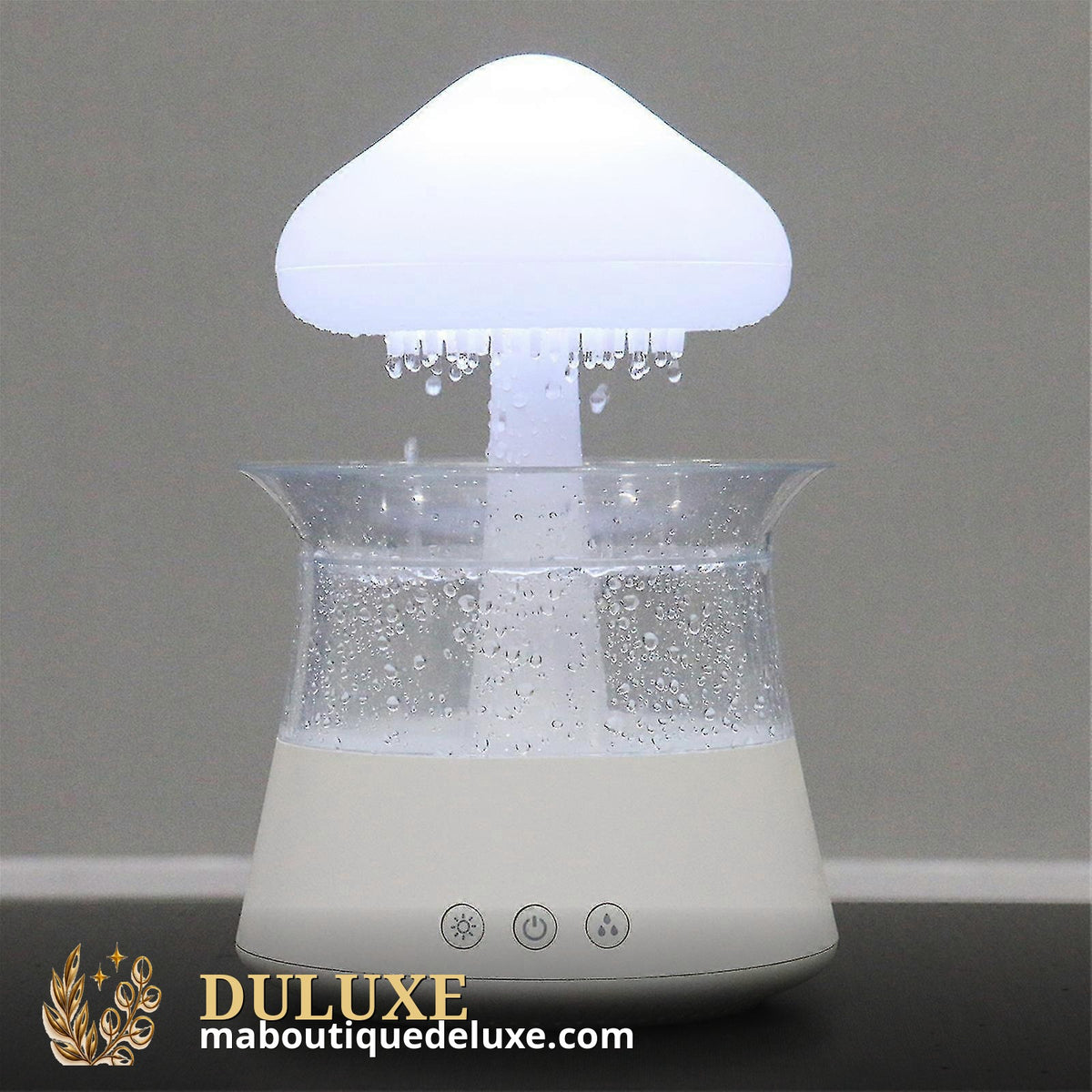 Humidificateur nuage de pluie lumineux avec gouttes et brume dans le noir