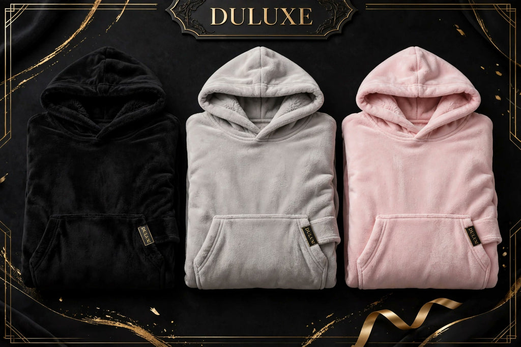 Trois couleurs de la couverture-hoodie chauffante DULUXE : Noir Onyx, Gris Perle et Rose Poudré