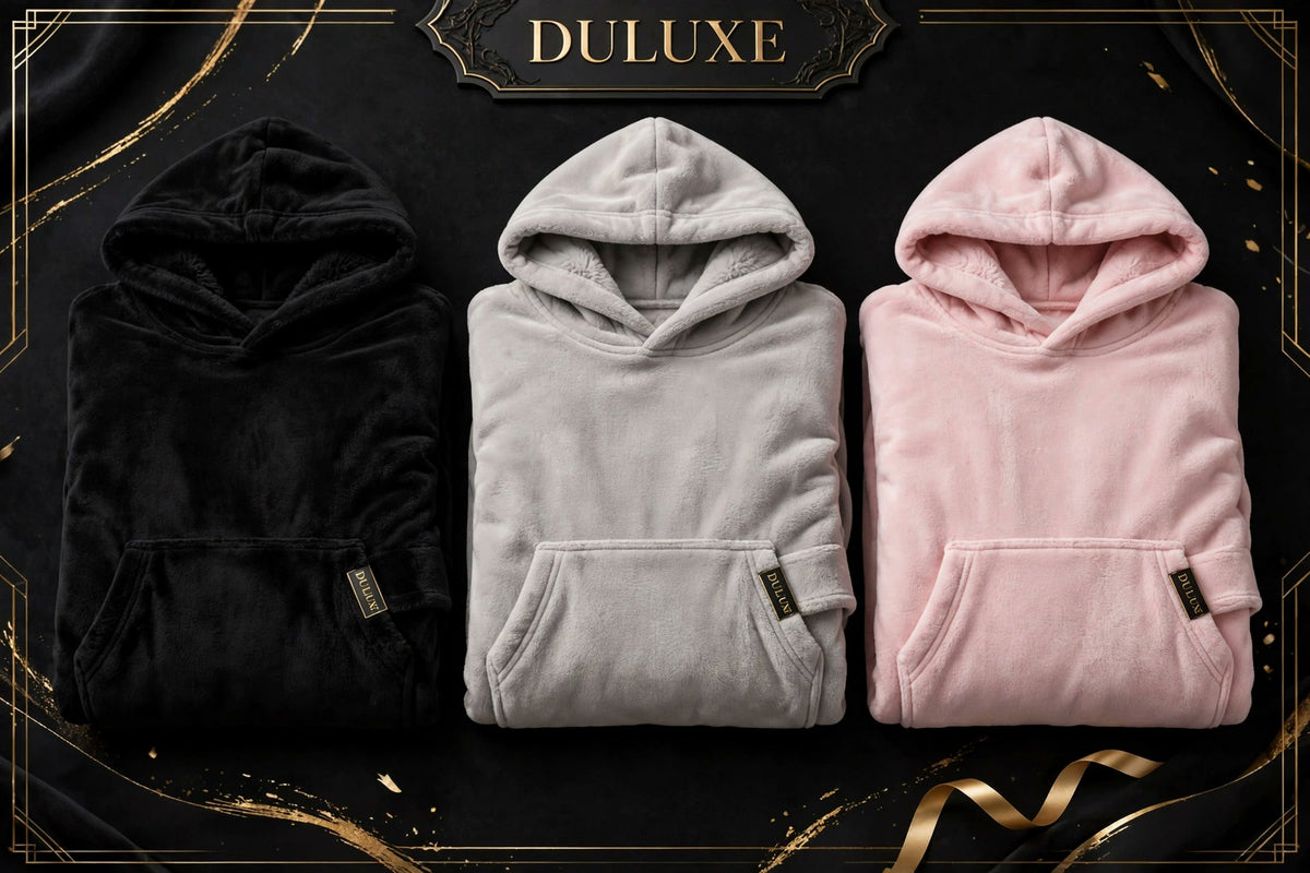 Trois couleurs de la couverture-hoodie chauffante DULUXE : Noir Onyx, Gris Perle et Rose Poudré