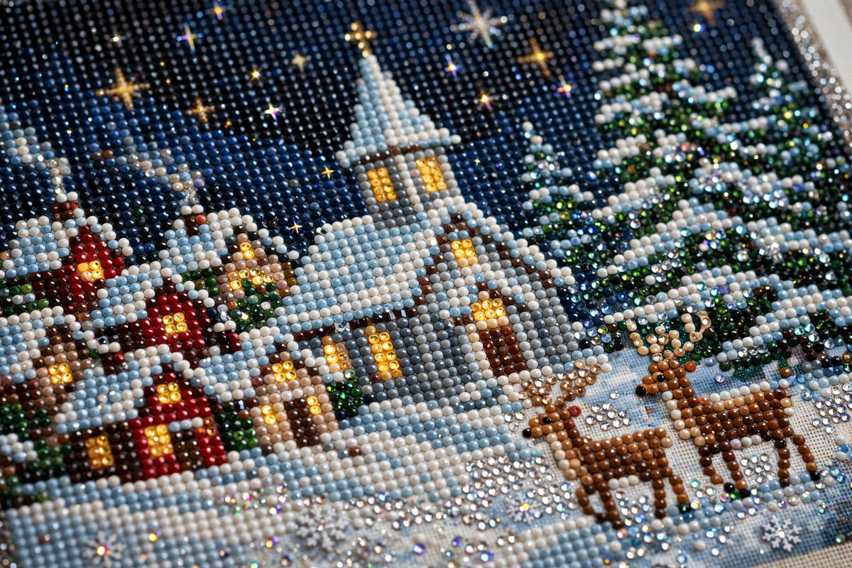Détail du motif village enneigé de la toile de peinture diamant DULUXE