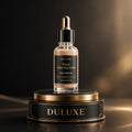 Sérum Teinté Correcteur Coréen DULUXE en flacon pipette sur écrin noir et doré