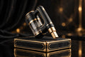 Mini Aspirateur Portable DULUXE noir et doré sur son coffret premium