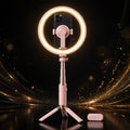 Perche à selfie magnétique rose avec anneau lumineux LED allumé, mini-trépied et télécommande Bluetooth