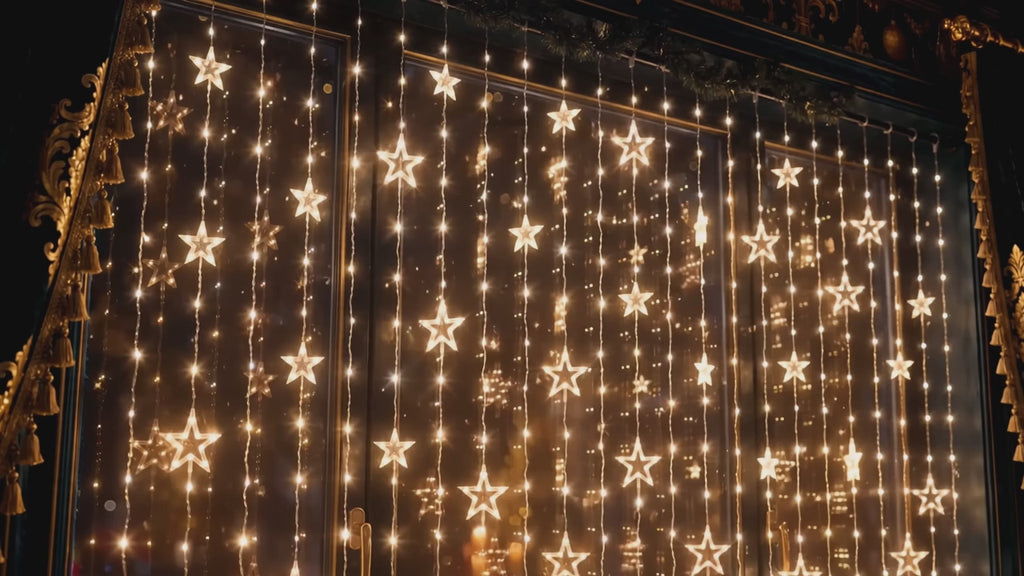 Vidéo : défilement des motifs animés du rideau lumineux de Noël DULUXE le soir